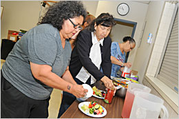 Participants sample healthy meals. Participants sample healthy meals.